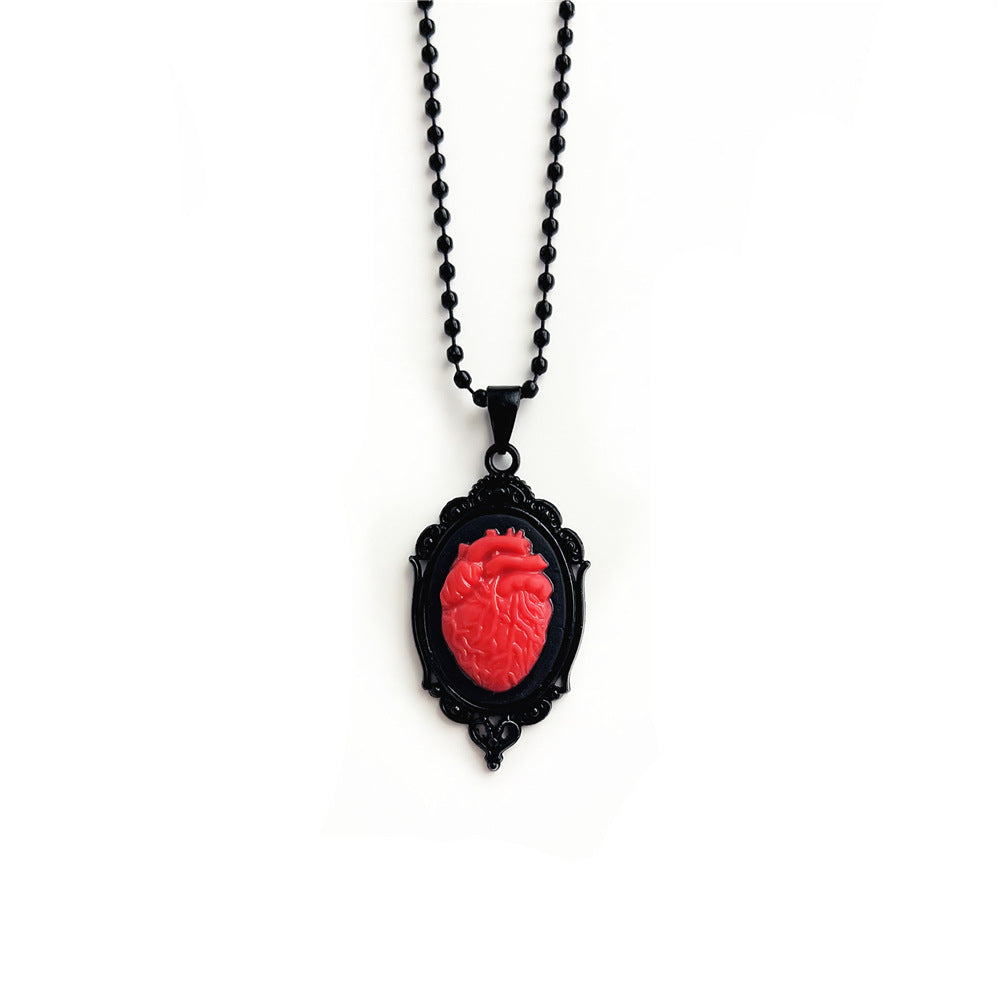 Collares de aleación de espejo de corazón de vampiro oscuro al por mayor